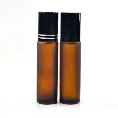 China Hot Selling Cosmetic 10ml Empty Refillable Round Frosted Amber Glass Essential Oil Roller Bottle for sale