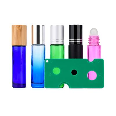 China Hot Selling Cosmetic Essential Oil Bottle Opener Green Blue Black Mini Tool for sale