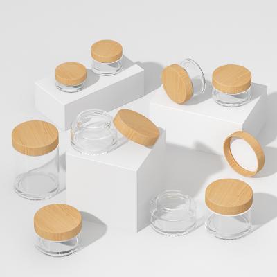 China 5g cosmetic empty 15g 30g 50g 100g frosted clear glass cream jar with bamboo cap for sale