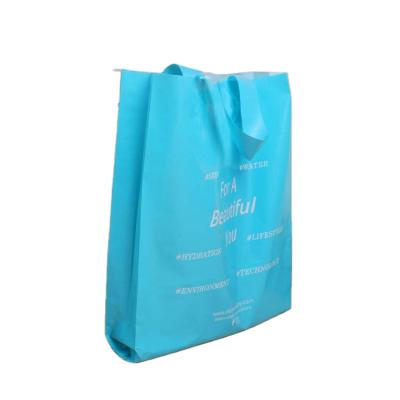 China Supermarket Recyclable Clothes Shopping Plastic Handbag With Logo for sale