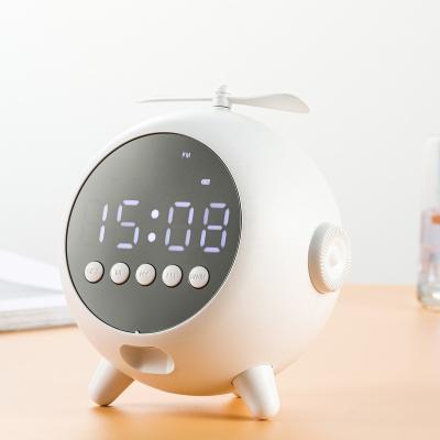 China Wireless Charger for BT Frontier TWS 5.0 New Cartoon Cell Phone Clock Speaker Portable Alarm Clock Speaker Audio System Souund for sale