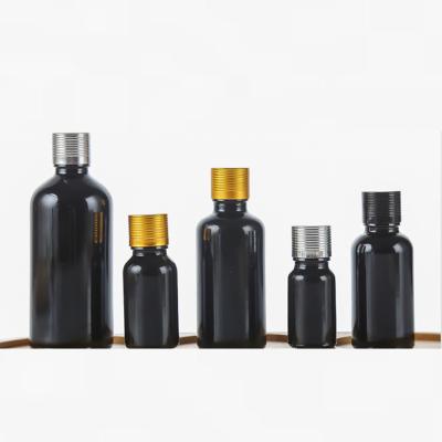 China Cosmetic Ready stock black essential oil bottle 5ml 10ml 15ml 20ml 30ml 50ml pure black glass essential oil bottle with child safety cap for sale