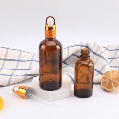 China Cosmetic 10ml 15ml 20ml 30ml 50ml 100ml amber frosted essential oil serum glass dropper bottle for sale