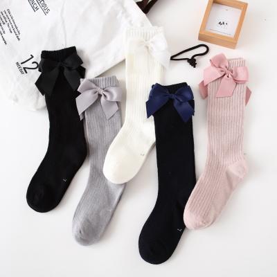 China Organic Cotton Baby Girls Solid Color Bow Socks Antibacterial Newborn Knee High Socks for sale