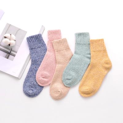 China Winter Sporty Solid Colored Thick Warm Velvet Socks Logo Wool Merino Socks for sale