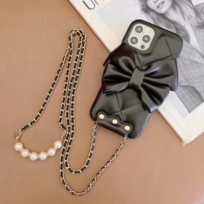 China Luxury Pink TPU+Leather Fashion Girls Cell Phone Case For 13pro 12 11pro 11 Diamond Leather Pearl Chain Smartphone iPhone 13 Max Cover for sale