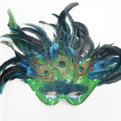 China Funny PVC Adult PVC Designers Party Mask Charms Carnival Mask With Green Feather for sale