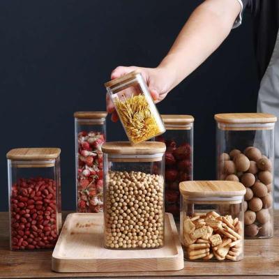 China Airtight Glass Freshness Preservation Square Jars Container with Bamboo Lid for Kitchen Food Snacks Seasoning Pasta Storage Bottle Seal Glass Container for sale