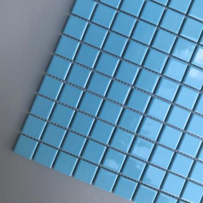 China 25x25mm solid blue ceramic mosaic tiles swimming pool for sale