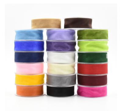 China Changxu 25mm New Arrival Small Bundle Viable Organza Fabric (25m/Roll) For Diy Decoration Party Organza Fabric Roll for sale