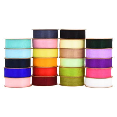 China Changxu Viable 10/25/38m Ribbons Factory Wholesale 100% Polyester Organza Ribbon Designer Ribbon Gift Wrapping Band for sale