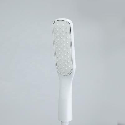 China Wholesale White ABS High Pressure Rainfall Diverter Bathroom Power Jet Shower Head Handheld Water Saving for sale