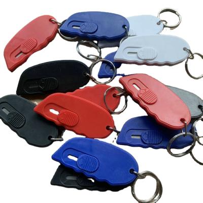 China Promotion with logo Mini Retractable Touch Portable Utility Pocket Knives Box Cutter Paper Cutter Key Chain for sale