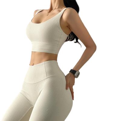 China 2021 New Breathable OEM Wholesale Size Naked Ribbed Yoga Yoga Sets Fitness Workout Sets Bra And Leggings for sale