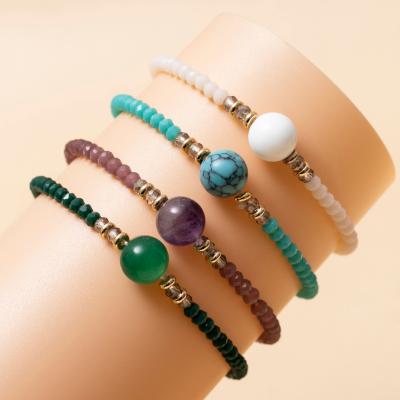 China 2021 Original Natural Crystal Tourmaline Female Black Strawberry Ghost Transfer Bead Couples Crystal Green Bracelet for sale