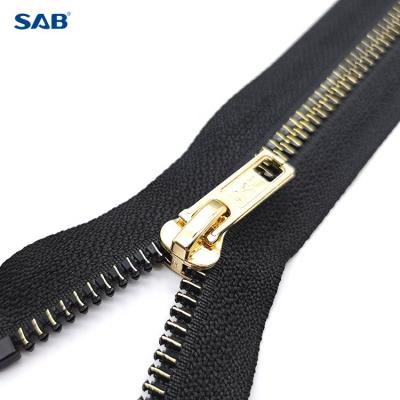 China High quality SAB metal 3# 5# 8#resin zipper of automatic lock is used to plated the gold zipper of the backpack for sale