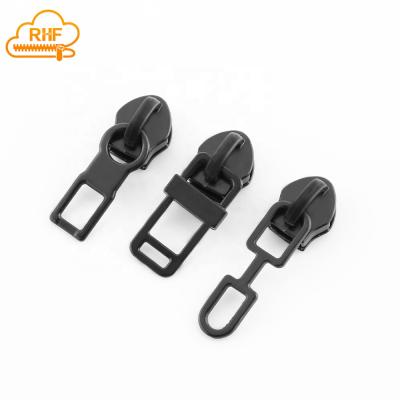 China Other OEM Zipper Factory 5# Bags Zinc Alloy Black Hollow Zipper Puller Zipper Slider for sale