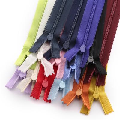 China Durable Nylon Recycle Zipper Roll 3# 4# 5# Open End Double Narrow End Long Chain Nylon Zipper For Wedding Dresses for sale