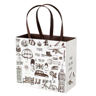 China Retro Rivet Retrievable Tote Bag Wrapping Clothes Gift Bag Simple Large Capacity Ins. for sale