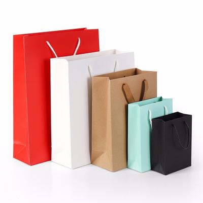 China Large, medium and small recyclable kraft paper gift bags that accept custom logos for sale