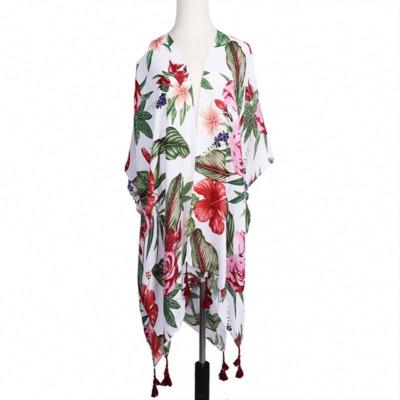 China Breathable Floral Ruana With Tassel Flower Print Spring Kimono Women Polyester Print Blouse Female Kimono for sale