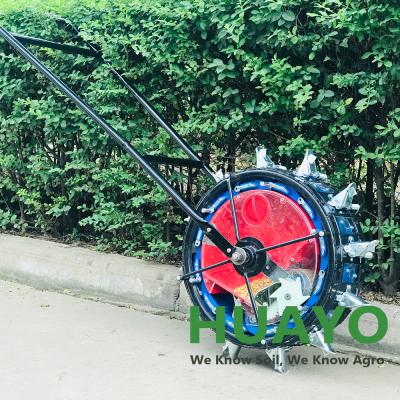 China Seed Planting Machine Seed Planting Machine Metal Step Till Precise Manual Seed Drill Planter for sale