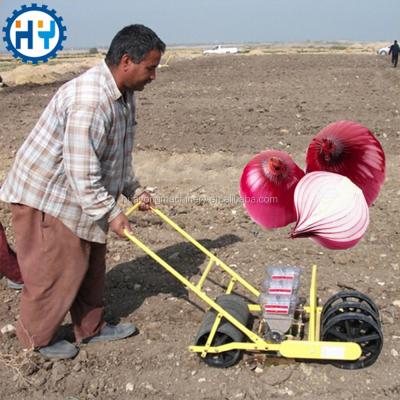 China Popular seed planting machine seed planting machine best hand push onion seed drill for sale