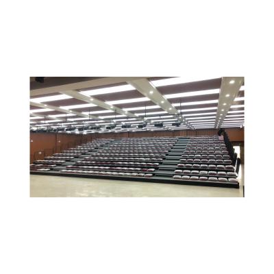 China Commercial indoor retractable bleachers with motorized operation en venta