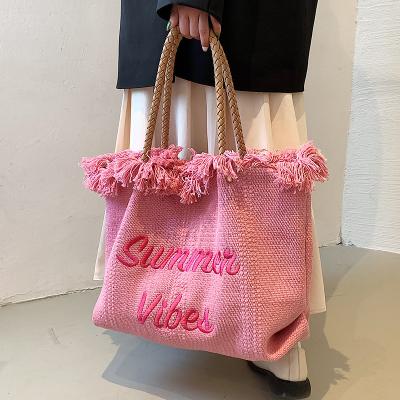 China Fashion Custom Canvas Ladies Tote Bag Large Capacity Tassel Bag Embroidered Letter For Armpits Wholesale Custom Logo Canvas Tote Bag for sale