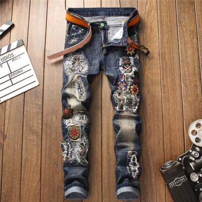 China New QUICK DRY original design autumn and winter embroidery blue holes stick fabric men's jeans for sale