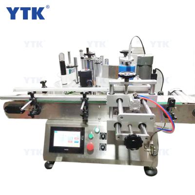 China Automatic Food Bottle Labeling Machine Placing Full Circle Label Sticker for Plastic Bottles Tin Cans Jars Vials for sale