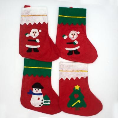 China Nonwoven Fabric Cheap Christmas Decorations Gifts Small Christmas Socks Gift Bag Pendant Christmas Tree Gift Bag for sale