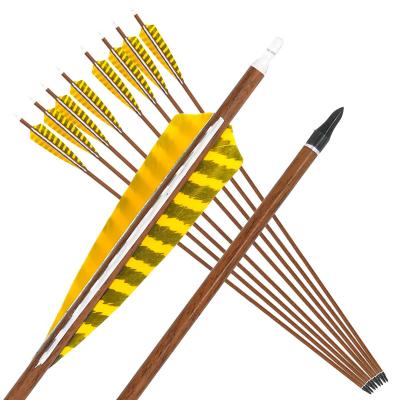 China Durable Wood Skin Pure Carbon Arrows Shafts Stripe color real turkey feathers for recurve bow take down bow hunting for sale