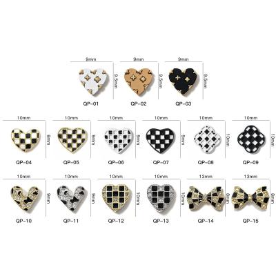 China Easy Apply Luxury Nail Charms New Arrival Black White Chessboard Heart Bow Zircon Nail Jewelry 3d Nail Art Decoration for sale