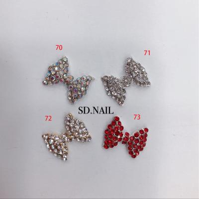 China Easy Apply Woman Nail Art Charm Bowknot Bowknot Alloy Rhinestone Pearl Nail Decoration 3d Nail Art Accessories for sale