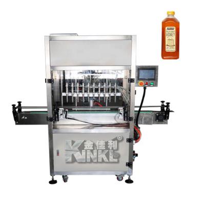 China New Type Automatic Food Honey Juice Sauce Portable Liquid Filling Machine for sale