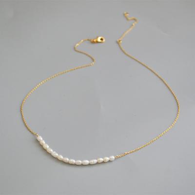 China LUOXIN FASHIONABLE Simple Classic Clavicle Face Pearl Necklace Thin Chain Smile Freshwater Necklace for sale