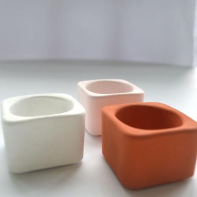 China Home Decoration Square Candle Holder Home Decor Candle Cup Material Cement Simple Design Glass Jars for sale