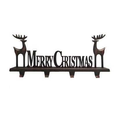 China Popular Christmas Gift Merry Christmas Metal Hanger Christmas Hook Stocking Holder For Holiday Greetings Wrap Fireplace Topper for sale