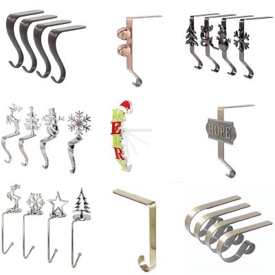 China Custom Popular Xmas Gift Gold Silver Metal Clip Hook Cast Iron Christmas Decoration Stocking Hanger Rack For Home Hotel for sale