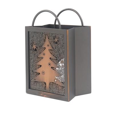 China Metal Tealight Lantern Pattern Candle Holder Hollow Outdoor Decorative Outdoor Garden Tree Hanging Candle Holder for sale