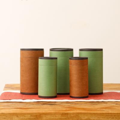 China Herb Kraft Paper Metal Box Xin Jia Yi Packaging Black Tin Handmade Lid Popcorn Tube for sale