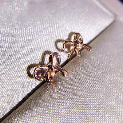 China Trendy NINE Trendy Real Women's Cheap Rose Gold Bow Stud Earrings 18K Solid Gold Bowknot Earrings for sale