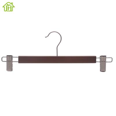 China Wholesale Durable Brown Wooden Skirt Hanger Factory Price Trouser Pants Hanger With Metal Clips for sale