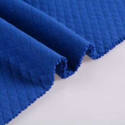 China 70% cotton 30% polyester diamond jacquard high quality anti-static air layer knit fabric for clothes en venta