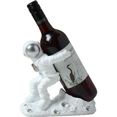 China Europe latest luxury decorative films design home Spacemansculpture wine rack decoration arts and crafts resin for sale