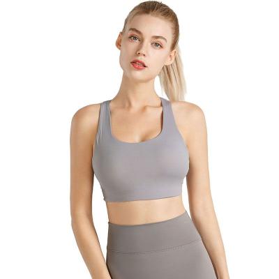 China 2022 Selling Strap Chest Sports Bras Top Short Vest Sleeve Sports Bras Hot Sexy Breathable Cavity Yoga Backless Bra for sale