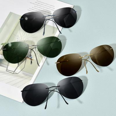 China Pilot Beta Titanium Rimless Screw Less High End Memory Polarized Men's Anti Ultraviolet Glasses Pilot Sunglasses Shades for sale