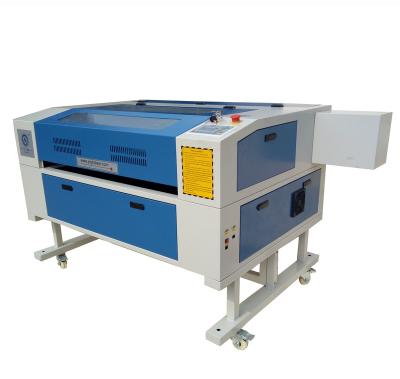 China Laser Engraving Coconut Shell Laser Cutting and Engraving Machine for sale