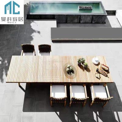 China Modern Outdoor Tables And Chairs Garden Waterproof Sunscreen Large Luxury 12 Seater Dining Table Set Teak Patio Furniture for sale